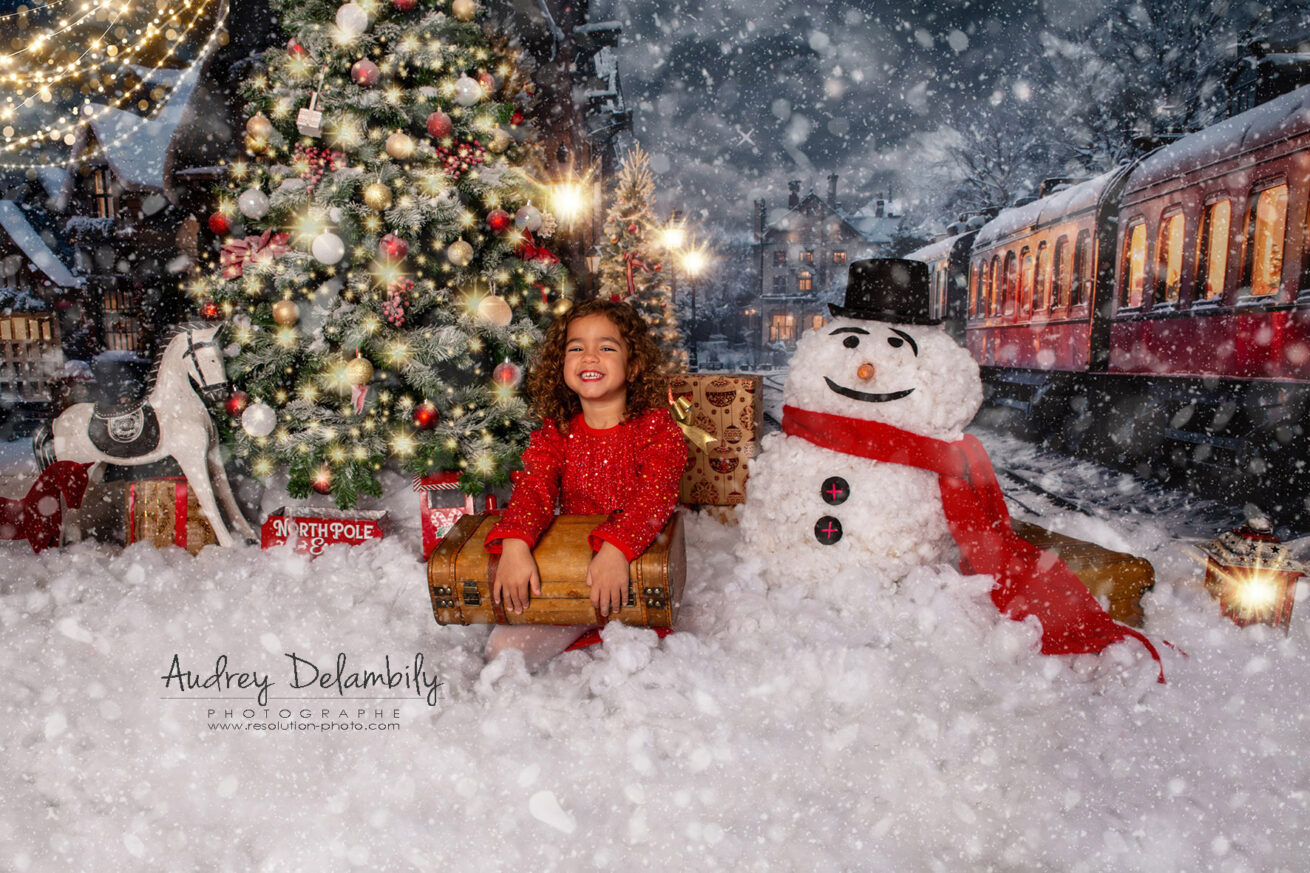 seance-photo-noel-enfant-bonhomme-neige